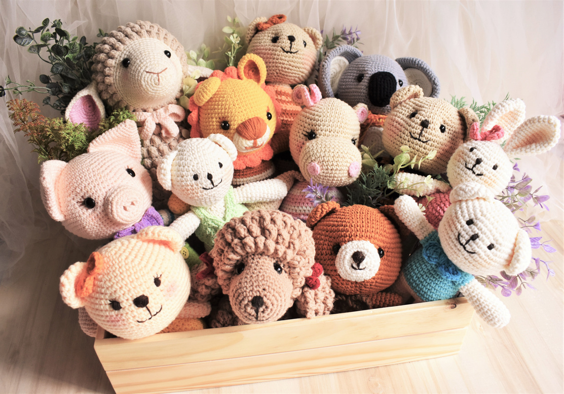 Animal crochet background. Cute toy for kid. Dog crochet. Sheep crocheting. Lion knitting. Woolen lamb. Pig crochet. Soft koala. Poodle dog. Hippo rabbit. Handmade toy. Colorful zoo. Bear crochet